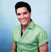 Elvis Presley Pictured In A Colorful Green Shirt